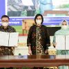 Bupati Kasmarni Hadiri Sosialisasi UU HKPD dan Menerima Hibah Pembangunan Dermaga Sungai Selari