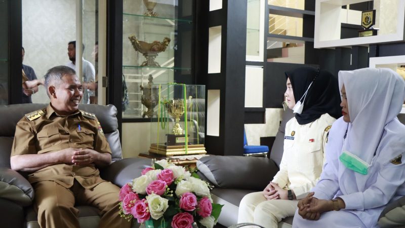 Pj Bupati Kampar Terima Sri Mulyani Sundari Puteri, Pembantu Protokoler Istana Pada HUT RI ke-77 Tahun 2022