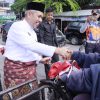 Semarak HUT RI Ke-77, Pj Bupati Bersama Sekda dan kepala OPD Bagikan Bendera Merah Putih