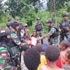 Kedatangan Satgas Yonif 132/BS disambut dengan suka cita oleh masyarakat Kampung Kalimao