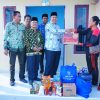 Bupati Alfedri Serahkan Bantuan Korban Angin Puting Beliung