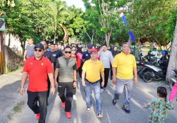 Gerak jalan dan Senam Semarak HUT Bhayangkara Yang Ke-77, Pj Bupati Kampar Serahkan Hadiah Utama Sepeda Motor