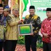 Bupati Alfedri Terima Piagam Penghargaan dari Ketua KBB Sadunia