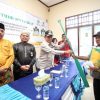 Bupati HM WARDAN Serahkan Perahu Nelayan Usaha Produktif Hasil Kolaborasi Baznas Provinsi Riau dan Kabupaten Inhil