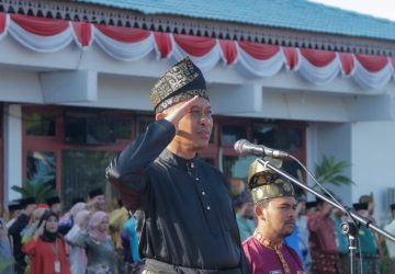 Berpakaian Melayu Lengkap, Pemkab Bengkalis Laksanakan Upacara Peringati Hari Jadi ke-66 Provinsi Riau