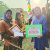 Apri Yeny.SE Serahkan Hadia Lomba Bidar di Danau Cecuho Desa Muara Lawai