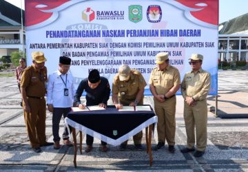 Pemkab Siak dan Penyelenggara Pemilu Tahun 2024 Tanda Tangan NPHD Pengawasan Pilkada