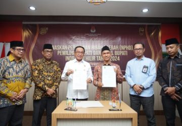 Bupati HM Wardan Bersama KPU Inhil Tandatangani Naskah Perjanjian Hibah Daerah Pendanaan Pilkada 2024