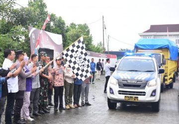 Pj Bupati Kampar Resmi Melepas Pendistribusian Logistik Pemilu ke Kecamatan