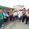 Pj Bupati Rizali Didampingi GRIB Jaya Muara Enim Serahkan Bantuan Korban Kebakaran Rumah Di Kelurahan Tungkal