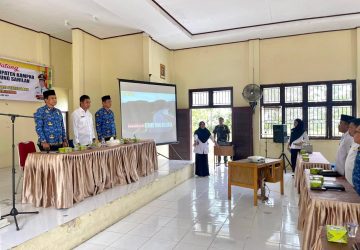 Pj Sekda Kampar Sosialisasikan Tata Kelola Administrasi dan Keuangan Desa di Gunung Sahilan