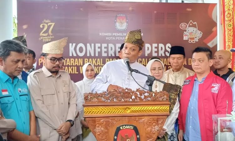 Ribuan Diantarkan Pendukung, Paslon Uun – Ade Hartati Resmi Mendaftar ke KPU Pekanbaru