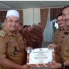 PJ Bupati Kerinci Serahkan Penghargaan kepada 10 Kepala Desa Berprestasi